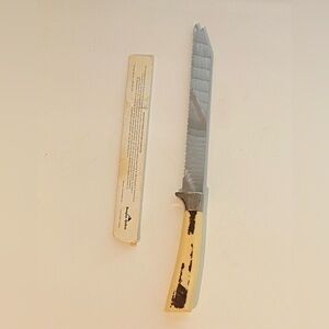 Sheffield England    Serrated Carving Knife with Cream and Brown Handle